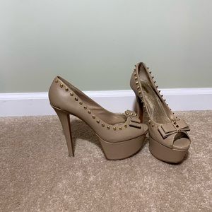 Wild pair tan heels with spikes